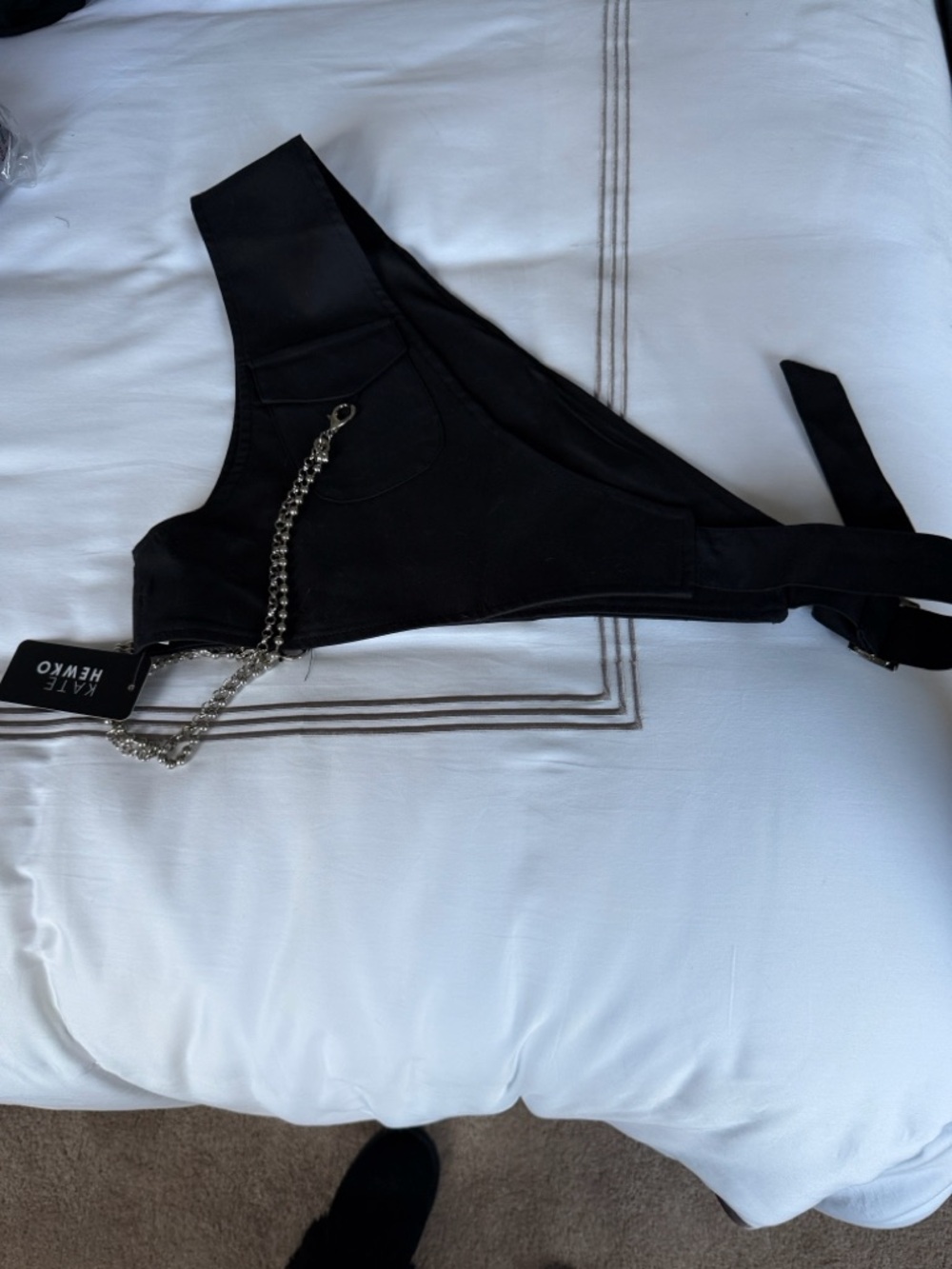 Khaite Black Asymmetric Crop Top with Chain Detail